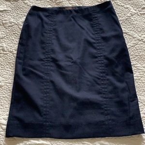 The limited navy pencil skirt